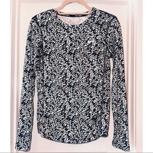 Nike Dri-fit long-sleeve running shirt. Black & white pattern. Size small.